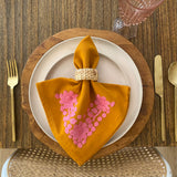 Set of 4 embroidered napkins mustard/pink