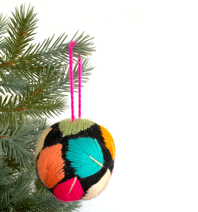 Embroidered felt ball black leaves