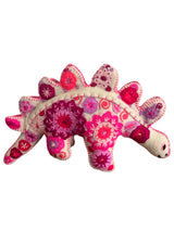 Embroidered felt stegosaurus