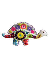 Embroidered felt spinosaurus